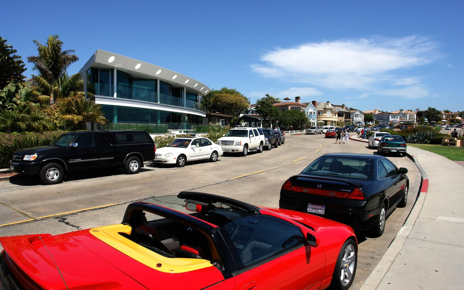 Hillside residential community with multiple single-family homes in Dana Point, California showing varied architecture and landscaping typical of established suburban neighborhoods